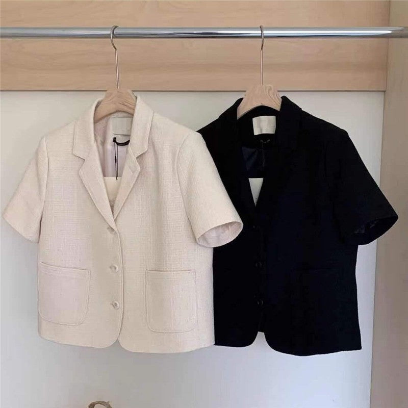 Relaxed-Fit Short Sleeve Jacket Featuring Solid Color Lapel