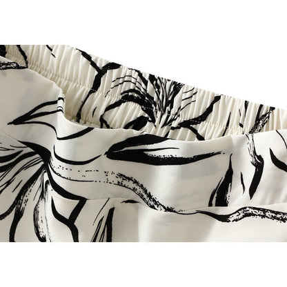 Sure! Here is an optimized title for your clothing product:

"Printed A-Line Skirt with Elastic Waistband