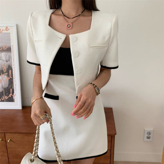 Stylish Ensemble featuring Color-Blocked Jacket and A-Line Skirt