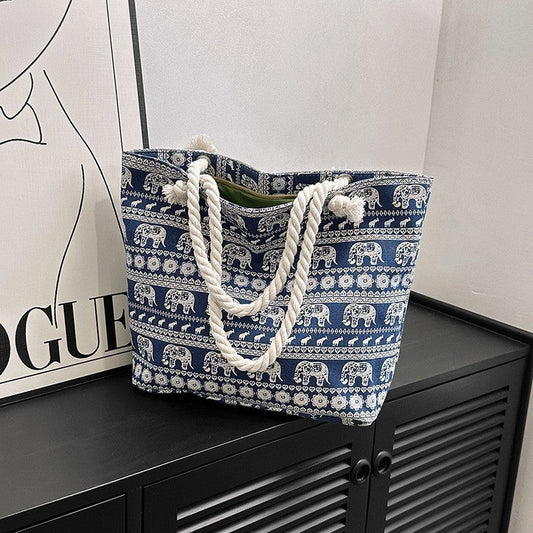 Chic Canvas Tote with Spacious Design and Printed Detail