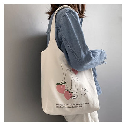Stylish One-Shoulder Canvas Bag Featuring Vibrant Orange Fruit Print