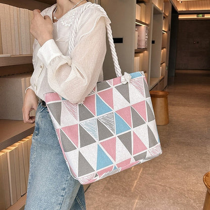Chic Canvas Tote with Spacious Design and Printed Detail