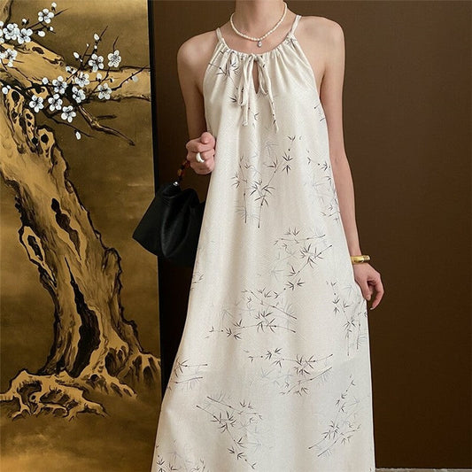 Sure! Here is an optimized title for your clothing product in English:

"Bamboo Fringed Hem Halterneck Maxi