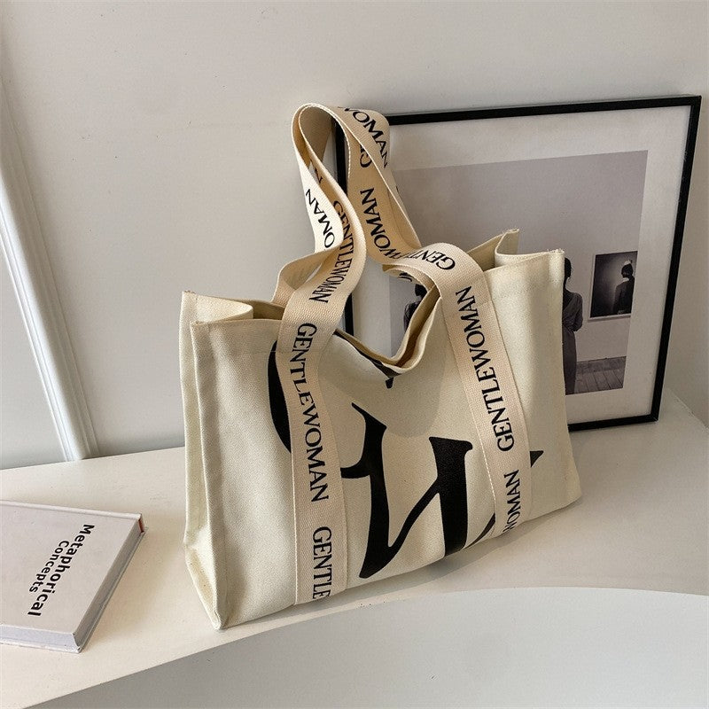Chic Canvas Tote Bag Featuring Bold Letter Print