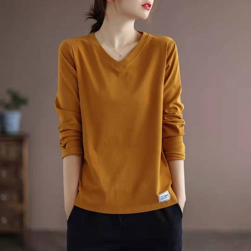 Sure! Here is an optimized title for your clothing product:

"Classic V-Neck Long Sleeve T-Shirt in Solid Color