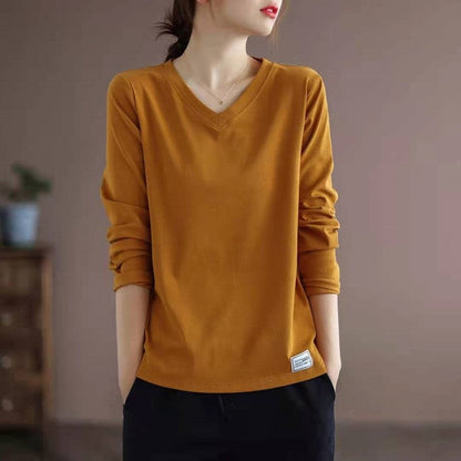 Sure! Here is an optimized title for your clothing product:

"Classic V-Neck Long Sleeve T-Shirt in Solid Color