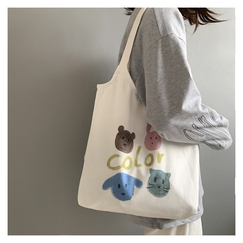 Stylish One-Shoulder Canvas Bag Featuring Vibrant Orange Fruit Print