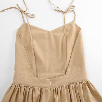 Sure! Here is an optimized title for your clothing product:

"Sleek Cut-Out Sleeveless Bodycon Cami Dress