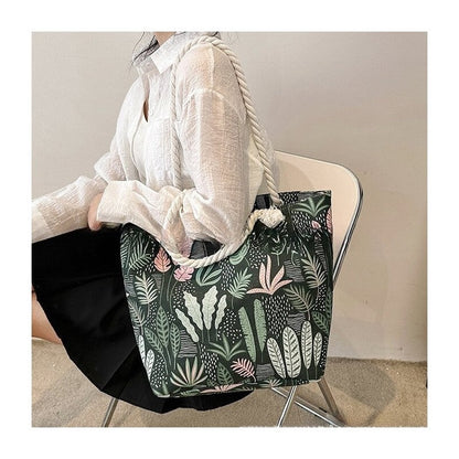 Chic Canvas Tote with Spacious Design and Printed Detail
