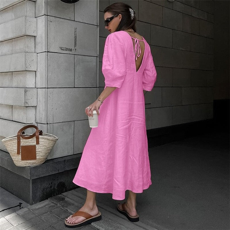 Sure! Here is an optimized title for your clothing product in English:

"Chic V-Neck Dress with Backless