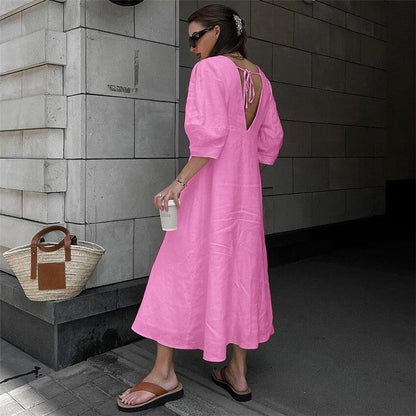 Sure! Here is an optimized title for your clothing product in English:

"Chic V-Neck Dress with Backless