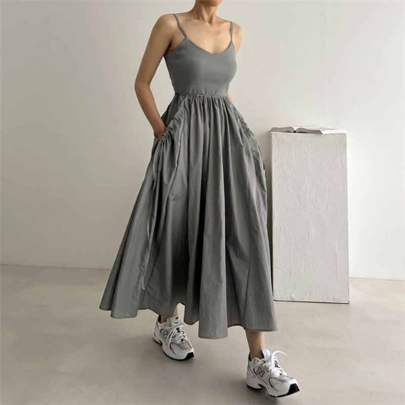 Solid Color U-Neck Backless Pleated Waistband Sling Dress

Suggested Optimized Title: "Chic