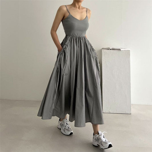 Solid Color U-Neck Backless Pleated Waistband Sling Dress

Suggested Optimized Title: "Chic
