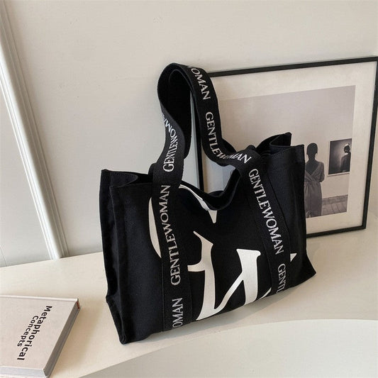 Chic Canvas Tote Bag Featuring Bold Letter Print