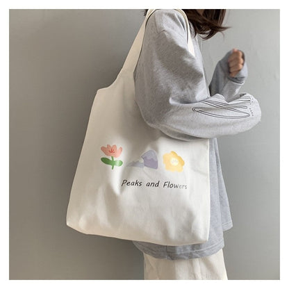 Stylish One-Shoulder Canvas Bag Featuring Vibrant Orange Fruit Print