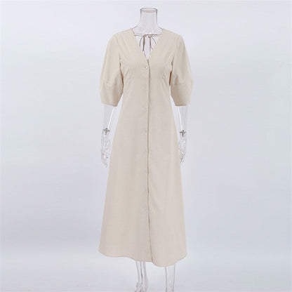 Sure! Here is an optimized title for your clothing product in English:

"Chic V-Neck Dress with Backless