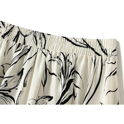 Sure! Here is an optimized title for your clothing product:

"Printed A-Line Skirt with Elastic Waistband