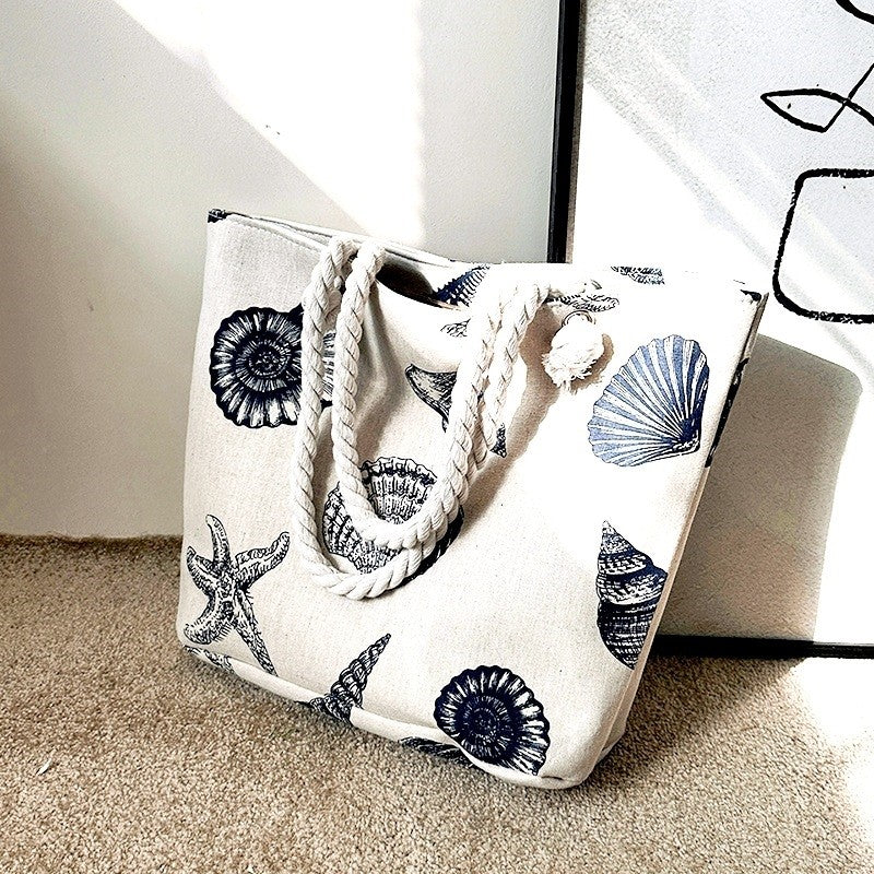 Chic Canvas Tote with Spacious Design and Printed Detail