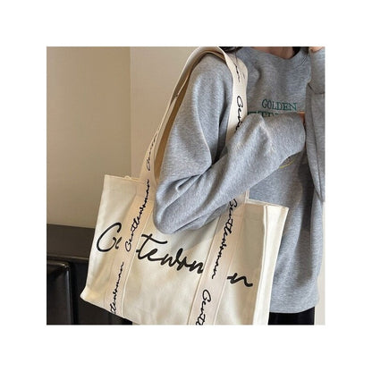 Chic Canvas Tote Bag Featuring Bold Letter Print