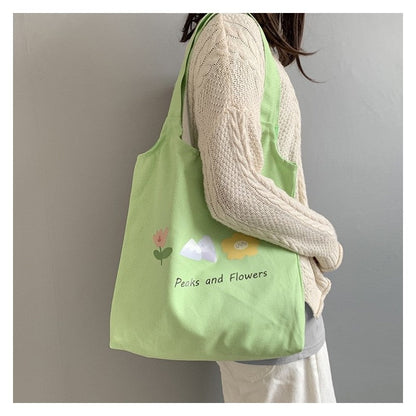 Stylish One-Shoulder Canvas Bag Featuring Vibrant Orange Fruit Print