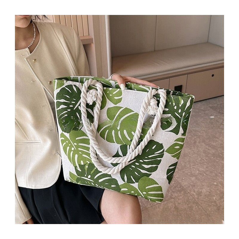 Chic Canvas Tote with Spacious Design and Printed Detail
