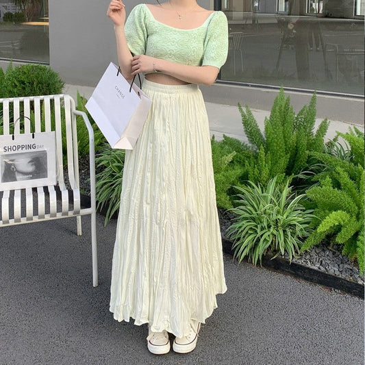Sure! Here is an optimized title for your clothing product in English:

"Chic Solid Color Elastic Waist Pleated A-Line